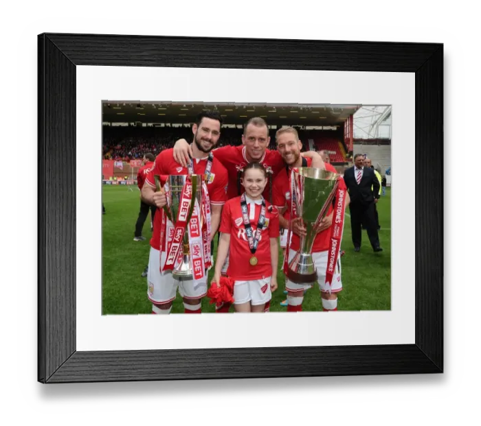 Framed Print : Bristol City Football Club: Champions League One and Johnstones Paint Trophy Victory Celebration - Scott Wagstaff, Greg Cunningham, and Aaron Wilbraham with Daughter Framed Print : Bristol City Football Club: Champions League One and Johnstones Paint Trophy Victory Celebration - Scott Wagstaff, Greg Cunningham, and Aaron Wilbraham with Daughter