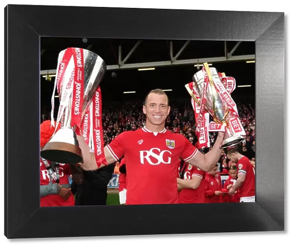 Bristol City's Glory: Aaron Wilbraham Lifts Sky Bet League One and JPT Trophies