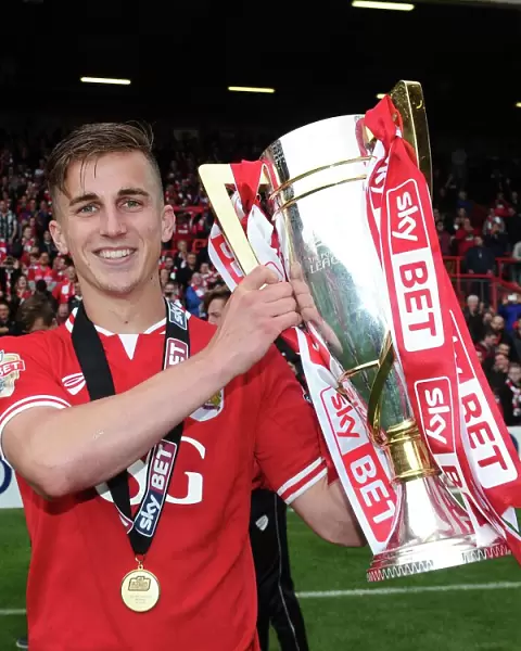 Bristol City Celebrates Promotion to Sky Bet Championship with Joe Bryan and League One Trophy