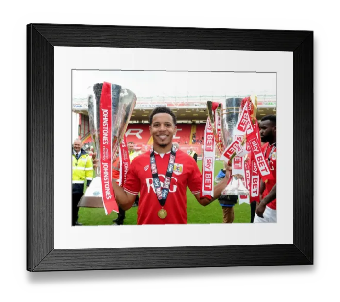 Framed Print : Bristol City's Korey Smith Lifts Sky Bet League One and JPT Trophies after Winning Double Framed Print : Bristol City's Korey Smith Lifts Sky Bet League One and JPT Trophies after Winning Double