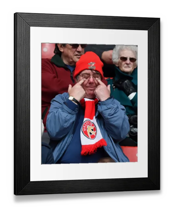 Framed Print : Tense Moment at Ashton Gate: A Walsall Supporter's Intense Expression during the Sky Bet League One Match between Bristol City and Walsall Framed Print : Tense Moment at Ashton Gate: A Walsall Supporter's Intense Expression during the Sky Bet League One Match between Bristol City and Walsall