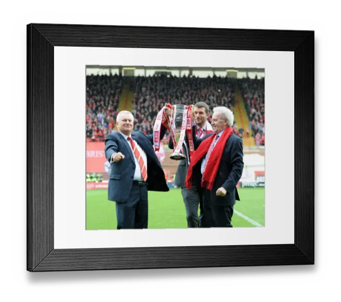Framed Print : Bristol City FC: Celebrating Promotion to Sky Bet League One with Steve Lansdown, Jon Lansdown, and Keith Dawe and the League One Trophy Framed Print : Bristol City FC: Celebrating Promotion to Sky Bet League One with Steve Lansdown, Jon Lansdown, and Keith Dawe and the League One Trophy