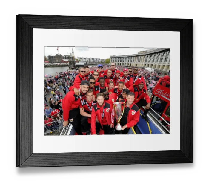 Framed Print : Bristol City FC's League One Victory Celebration: Thousands Rejoice with Players and Manager Framed Print : Bristol City FC's League One Victory Celebration: Thousands Rejoice with Players and Manager