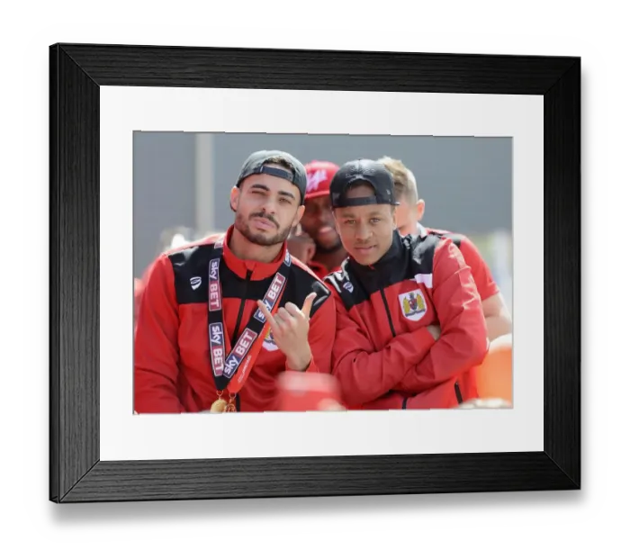 Framed Print : Bristol City's Derrick Williams and Bobby Reid Celebrate Promotion to Championship