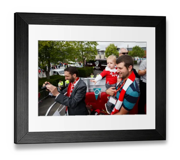 Framed Print : Bristol City FC: Champions Triumph - Vice Chairman Jon Lansdown and Son Amidst the Cheers of the Bus Parade Crowd Framed Print : Bristol City FC: Champions Triumph - Vice Chairman Jon Lansdown and Son Amidst the Cheers of the Bus Parade Crowd