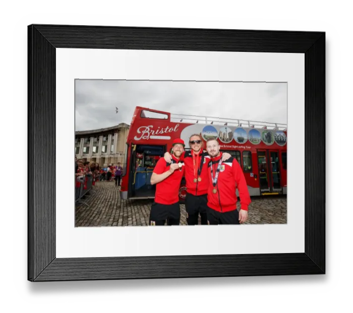 Framed Print : Bristol City Champions: Greg Cunningham, Luke Ayling, and Wade Elliott Celebrate Promotion to Championship on Open Top Bus Parade Framed Print : Bristol City Champions: Greg Cunningham, Luke Ayling, and Wade Elliott Celebrate Promotion to Championship on Open Top Bus Parade
