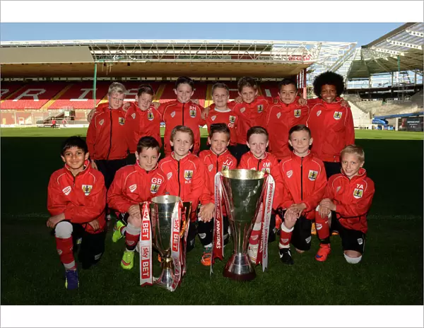 Bristol City Academy Players Celebrate with Johnstones Paint and Sky Bet League One Trophies