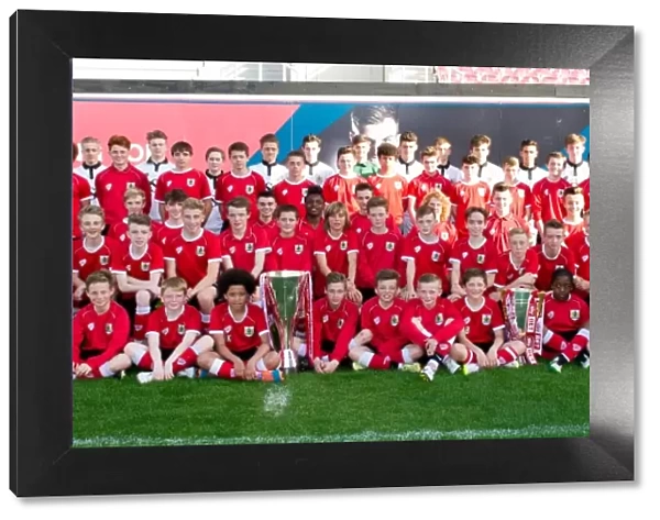 Bristol City Academy Players Celebrate with Johnstones Paint and Sky Bet League One Trophies