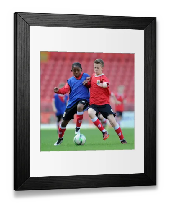 Framed Print : Bristol City Academy Players Train at Ashton Gate Stadium