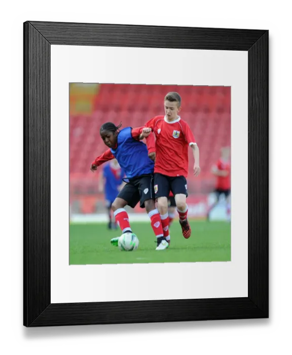 Framed Print : Bristol City Academy Players Train at Ashton Gate Stadium