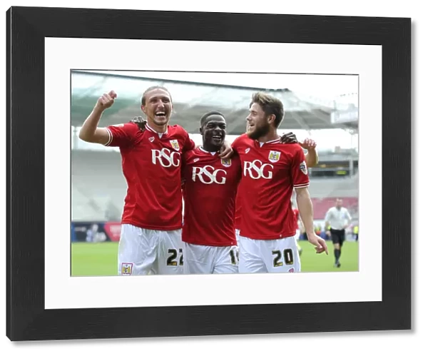 Triumphant Threesome: Agard, Ayling, and Burns Celebrate Double Delight in Bristol City's Promotion Push (3 May 2015)