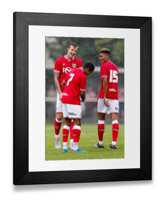 Framed Print : Bristol City Footballers Korey Smith, Aiden Flint, and Lloyd Kelly Share a Laugh After Goal in Pre-Season Community Match Framed Print : Bristol City Footballers Korey Smith, Aiden Flint, and Lloyd Kelly Share a Laugh After Goal in Pre-Season Community Match