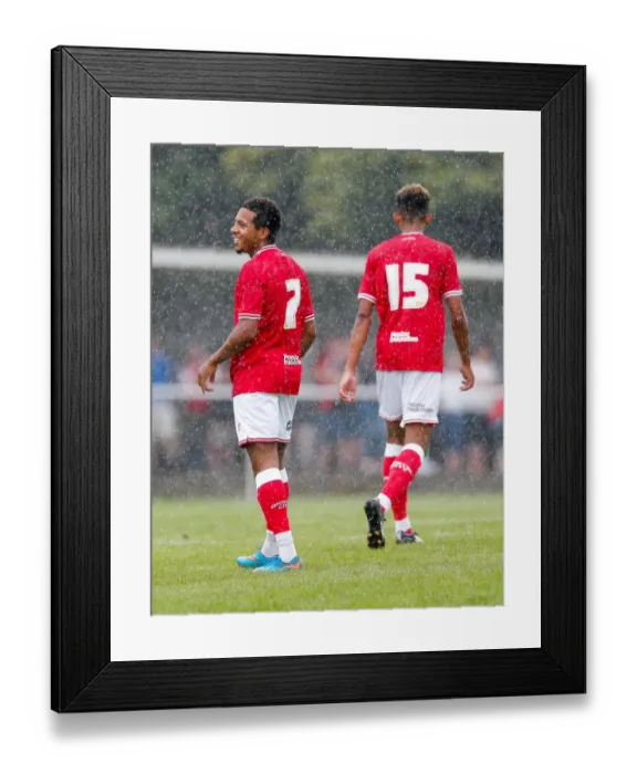 Framed Print : Korey Smith's Smiling Moment: Goal Scorer Celebrates in Preseason Community Match for Bristol City