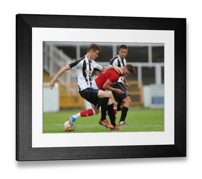 Framed Print : Bristol City's Wes Burns Faces Off Against Bath City's Luke Matthews during Pre-Season Friendly at Twerton Park (July 2015) Framed Print : Bristol City's Wes Burns Faces Off Against Bath City's Luke Matthews during Pre-Season Friendly at Twerton Park (July 2015)