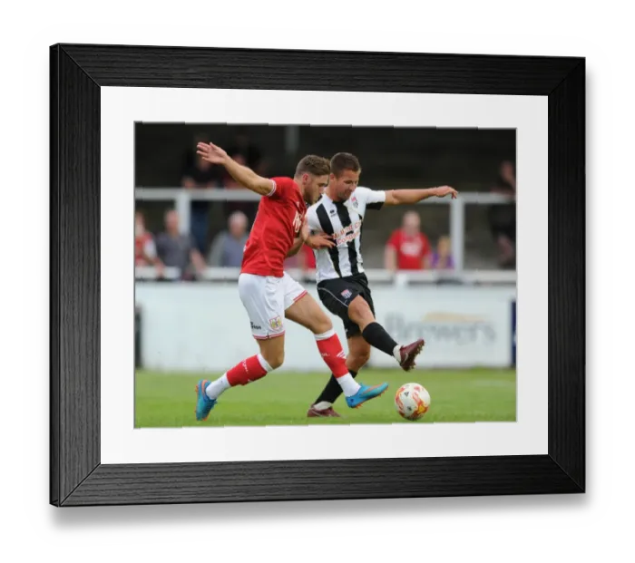 Framed Print : Wes Burns vs Dan Ball: Intense Rivalry in the Pre-Season Friendly at Twerton Park