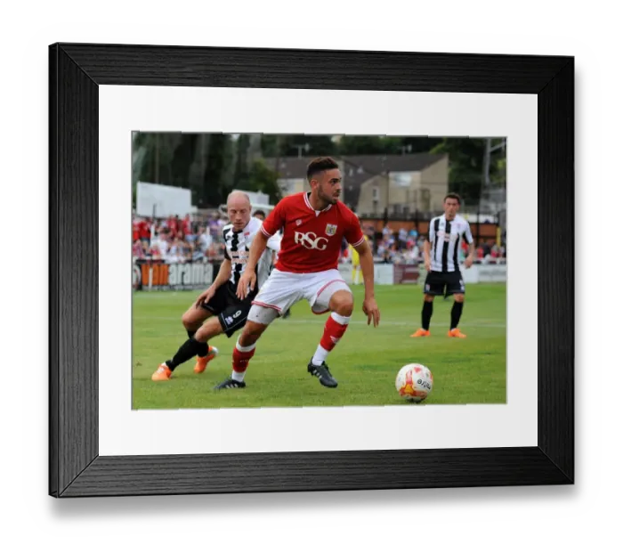 Framed Print : Bristol City's Derrick Williams Faces Off Against Bath City's Dave Pratt in Pre-Season Friendly Clash Framed Print : Bristol City's Derrick Williams Faces Off Against Bath City's Dave Pratt in Pre-Season Friendly Clash