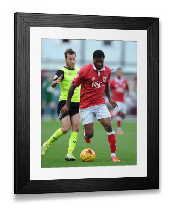 Framed Print : Battling for Control: Mark Little vs. James Dayton - Bristol City vs. Oldham Athletic Framed Print : Battling for Control: Mark Little vs. James Dayton - Bristol City vs. Oldham Athletic