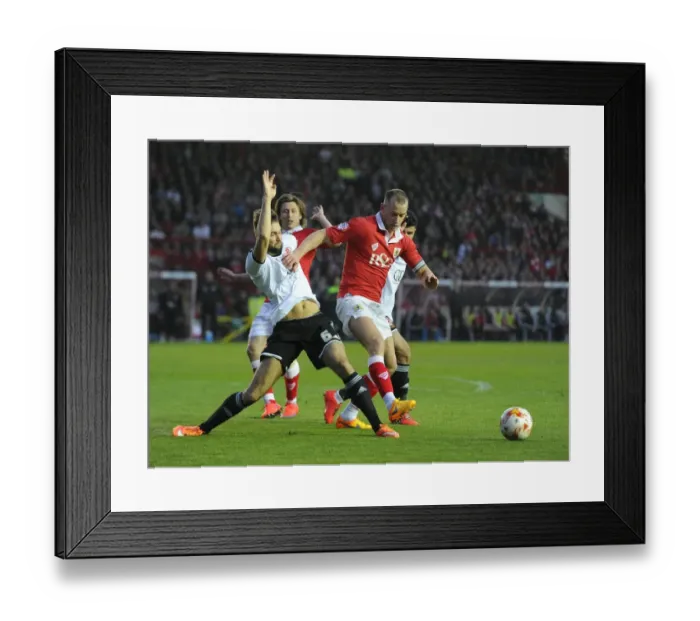 Framed Print : Battling for Supremacy: Wilbraham vs Turnbull in the Heated Rivalry of Bristol City vs Swindon Town (April 2015)