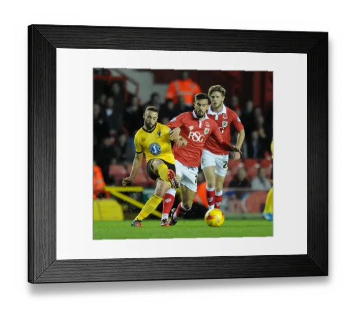 Framed Print : Marlon Pack of Bristol City Closes In on Sammy Moore of AFC Wimbledon during Johnstone's Paint Trophy Match