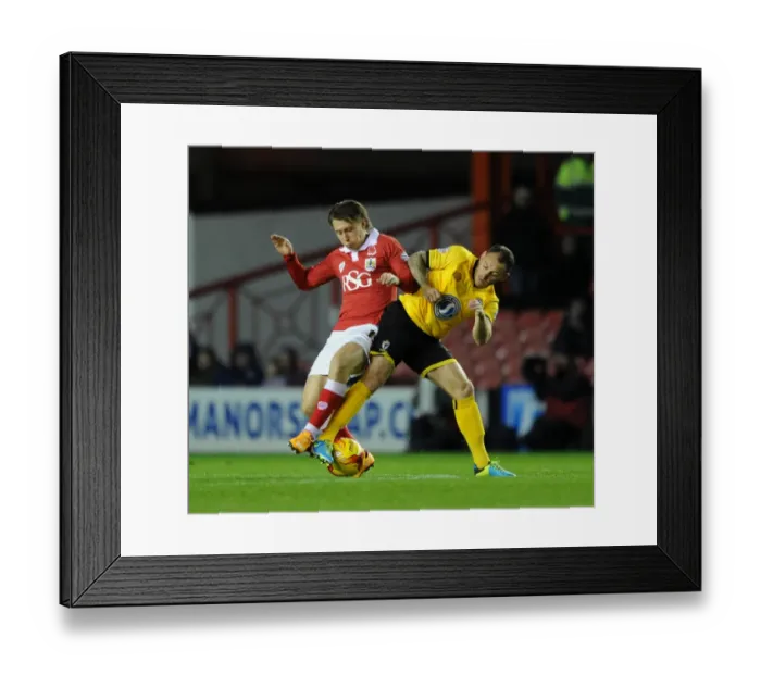 Framed Print : Bristol City vs AFC Wimbledon: Luke Freeman Tackled by Barry Fuller in Johnstone's Paint Trophy Clash