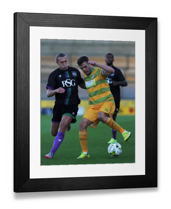 Framed Print : Bristol City's Luke Freeman Tackles Yeovil Town's Ryan Dickson in Pre-Season Clash Framed Print : Bristol City's Luke Freeman Tackles Yeovil Town's Ryan Dickson in Pre-Season Clash