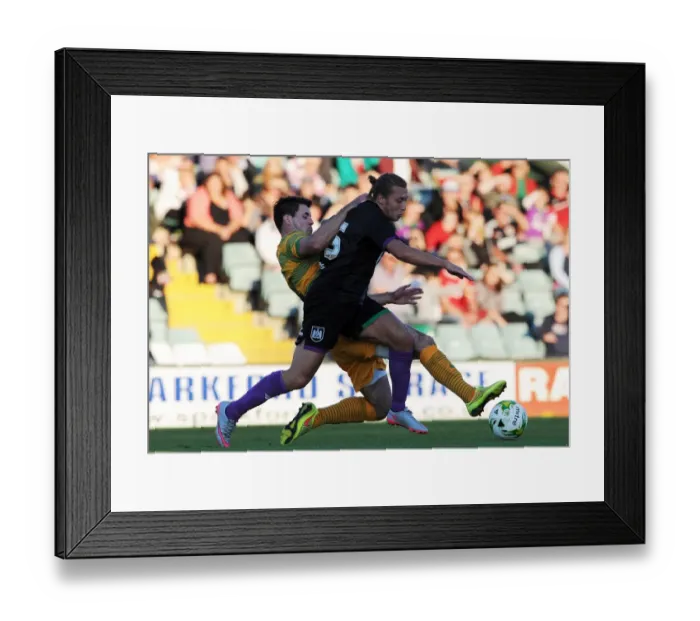 Framed Print : Bristol City's Luke Freeman Tackles Opponent in Pre-Season Clash Framed Print : Bristol City's Luke Freeman Tackles Opponent in Pre-Season Clash