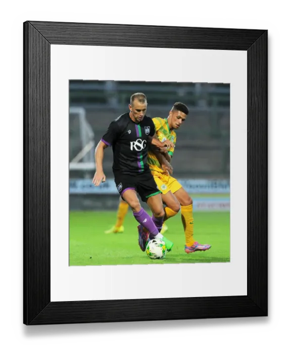 Framed Print : Aaron Wilbraham vs Jamie Burrows: Intense Moment in the Pre-Season Clash between Yeovil Town and Bristol City Framed Print : Aaron Wilbraham vs Jamie Burrows: Intense Moment in the Pre-Season Clash between Yeovil Town and Bristol City