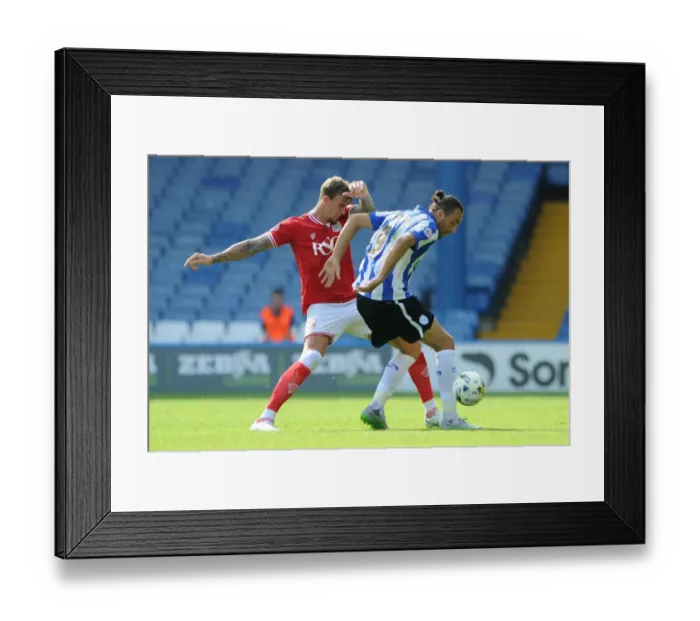 Framed Print : Aden Flint vs Atdhe Nuhiu: Intense Clash at Hillsborough Stadium - Sheffield Wednesday vs Bristol City, Sky Bet Championship Framed Print : Aden Flint vs Atdhe Nuhiu: Intense Clash at Hillsborough Stadium - Sheffield Wednesday vs Bristol City, Sky Bet Championship