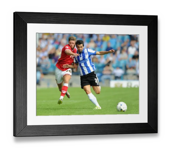 Framed Print : Wes Burns vs. Alex Lopez: Battle for Ball Possession in Sheffield Wednesday vs. Bristol City Championship Clash Framed Print : Wes Burns vs. Alex Lopez: Battle for Ball Possession in Sheffield Wednesday vs. Bristol City Championship Clash