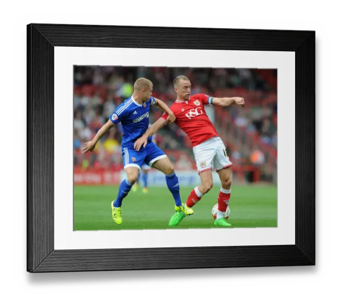 Framed Print : Bristol City vs. Brentford: Intense Battle for the Ball between Aaron Wilbraham and Jake Bidwell Framed Print : Bristol City vs. Brentford: Intense Battle for the Ball between Aaron Wilbraham and Jake Bidwell