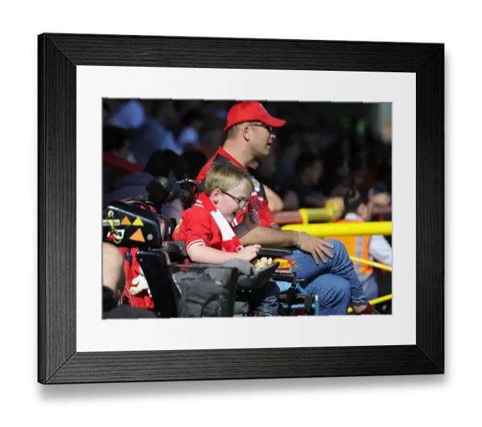 Framed Print : Young Fan's Excitement: Bristol City vs. Brentford at Ashton Gate Framed Print : Young Fan's Excitement: Bristol City vs. Brentford at Ashton Gate