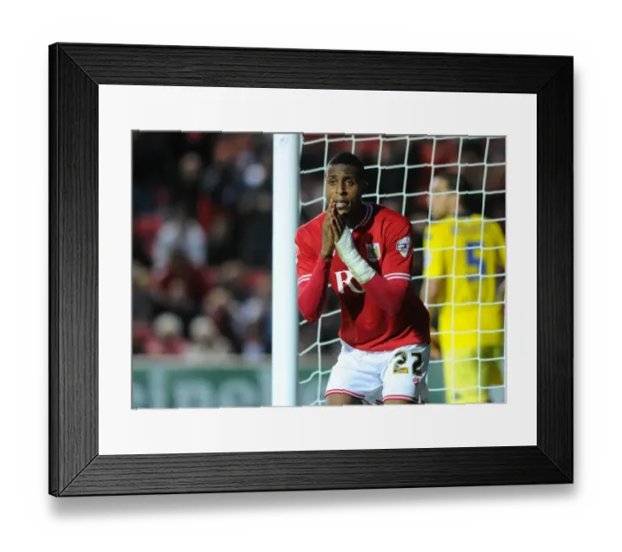Framed Print : Jonathan Kodjia's Disappointment: Missed Opportunity for Bristol City Against Leeds United (August 2015) Framed Print : Jonathan Kodjia's Disappointment: Missed Opportunity for Bristol City Against Leeds United (August 2015)