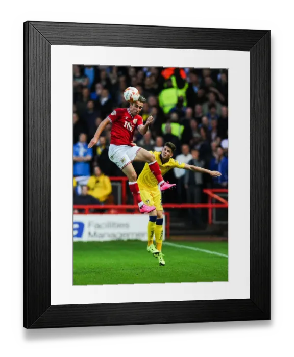 Framed Print : Bristol City vs Leeds United: Joe Bryan's Headed Clash with Sam Byram Framed Print : Bristol City vs Leeds United: Joe Bryan's Headed Clash with Sam Byram