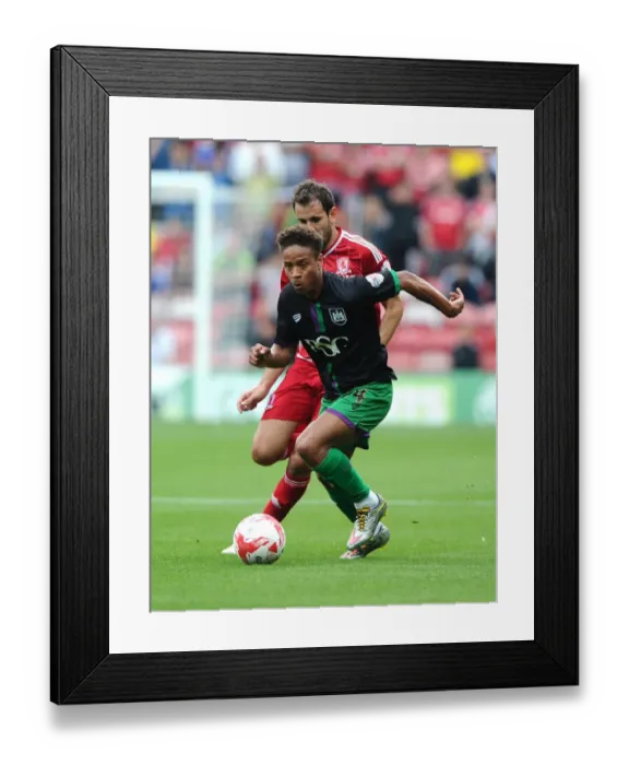 Framed Print : Bobby Reid vs Christian Stuani: Battle for Supremacy in Middlesbrough vs Bristol City Championship Clash Framed Print : Bobby Reid vs Christian Stuani: Battle for Supremacy in Middlesbrough vs Bristol City Championship Clash