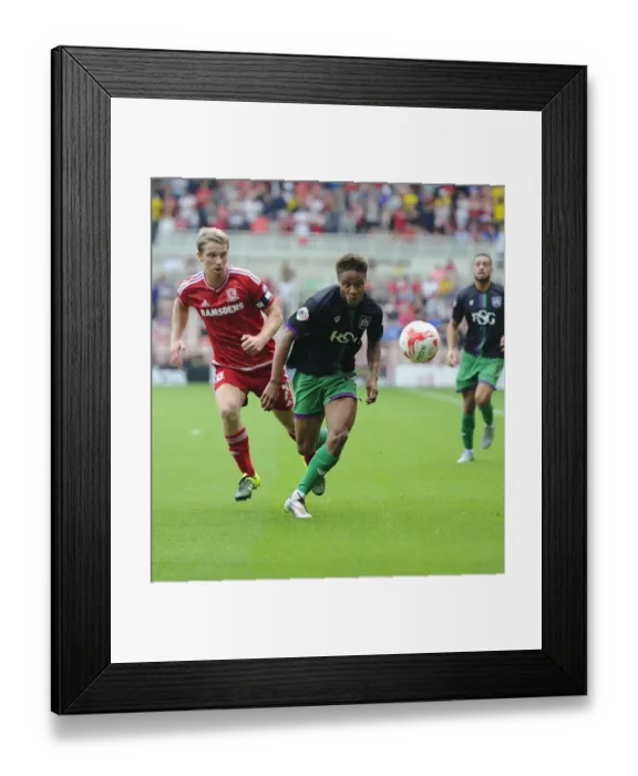 Framed Print : Bobby Reid vs Grant Leadbitter: Intense Battle for Ball Possession in Middlesbrough vs Bristol City Championship Clash Framed Print : Bobby Reid vs Grant Leadbitter: Intense Battle for Ball Possession in Middlesbrough vs Bristol City Championship Clash