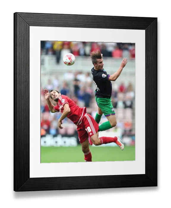 Framed Print : Battling for Supremacy: Joe Bryan vs. Christian Stuani in Middlesbrough vs. Bristol City Championship Clash Framed Print : Battling for Supremacy: Joe Bryan vs. Christian Stuani in Middlesbrough vs. Bristol City Championship Clash