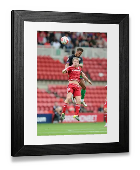 Framed Print : Bobby Reid vs Grant Leadbitter: Aerial Battle at Riverside Stadium - Middlesbrough vs Bristol City, Sky Bet Championship Framed Print : Bobby Reid vs Grant Leadbitter: Aerial Battle at Riverside Stadium - Middlesbrough vs Bristol City, Sky Bet Championship