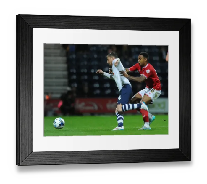 Framed Print : Bristol City's Liam Moore Closes In on Preston North End's Joe Garner Framed Print : Bristol City's Liam Moore Closes In on Preston North End's Joe Garner