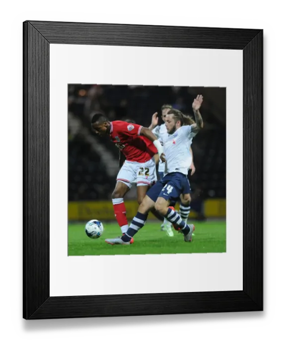 Framed Print : Intense Championship Showdown: Kodjia vs May at Deepdale Stadium Framed Print : Intense Championship Showdown: Kodjia vs May at Deepdale Stadium