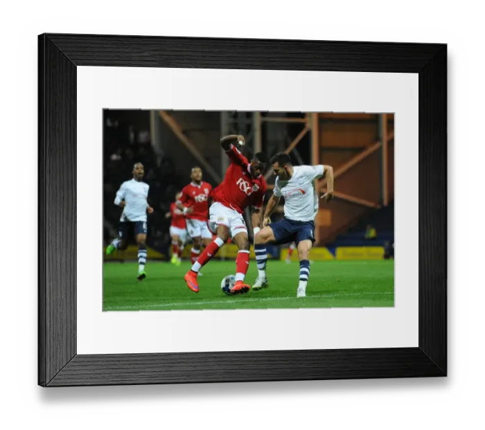 Framed Print : Bristol City's Kodjia Spins Past Preston's Wright in Championship Clash