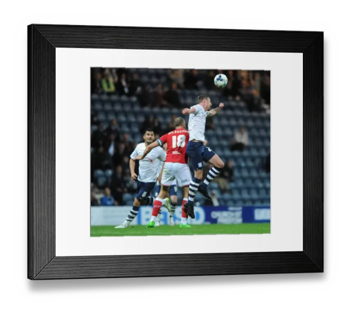 Framed Print : Intense Aerial Clash: Wilbraham vs. Huntington at Deepdale Stadium Framed Print : Intense Aerial Clash: Wilbraham vs. Huntington at Deepdale Stadium