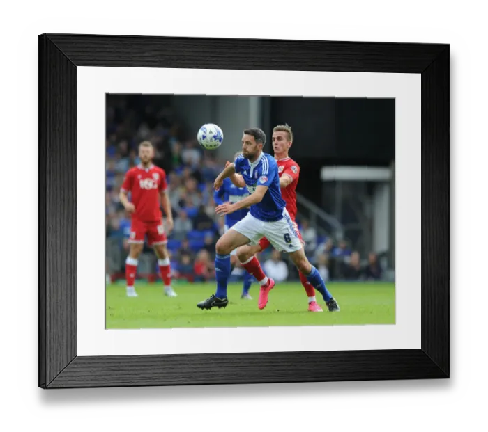 Framed Print : Bristol City's Joe Bryan Closes In on Former Teammate Cole Skuse in Ipswich Derby Framed Print : Bristol City's Joe Bryan Closes In on Former Teammate Cole Skuse in Ipswich Derby