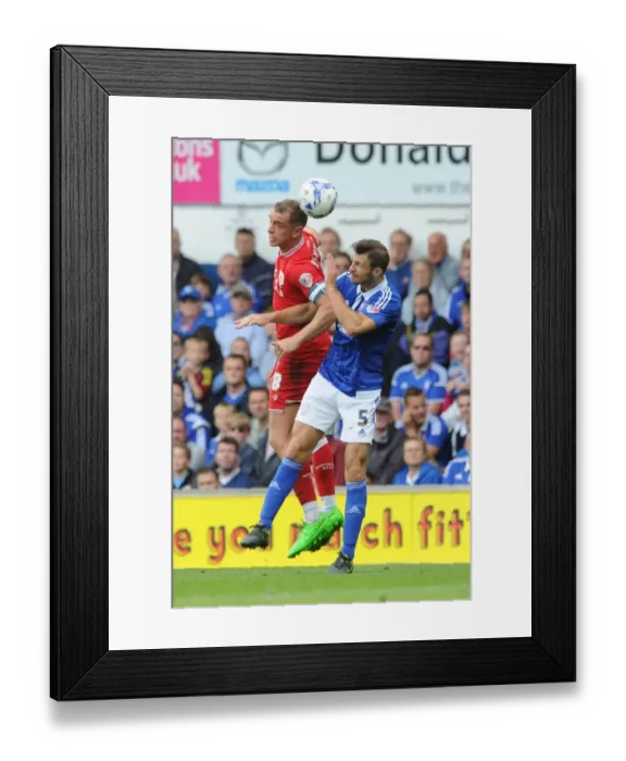Framed Print : Bristol City's Aaron Wilbraham Battles for Header Against Ipswich Town's Tommy Smith Framed Print : Bristol City's Aaron Wilbraham Battles for Header Against Ipswich Town's Tommy Smith