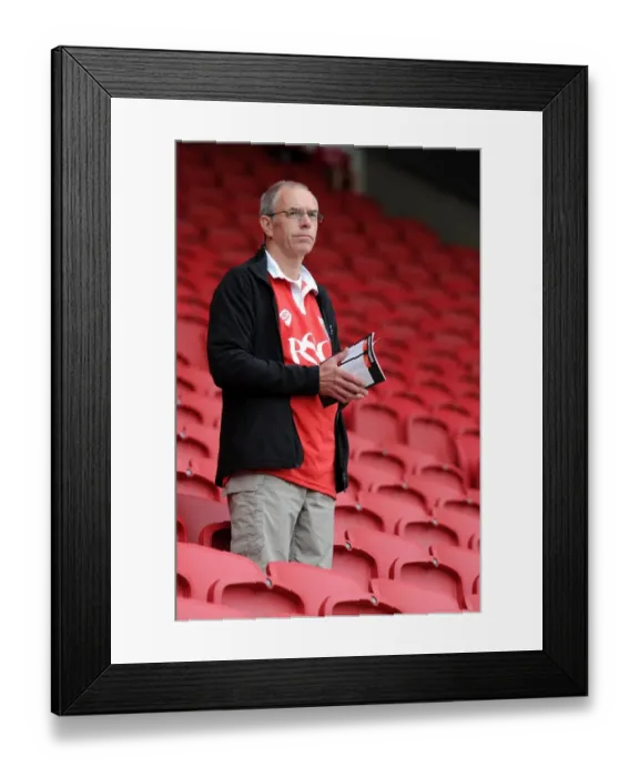 Framed Print : Bristol City FC: A Fan's Intense Focus at Ashton Gate during Bristol City vs MK Dons (Sky Bet Championship)