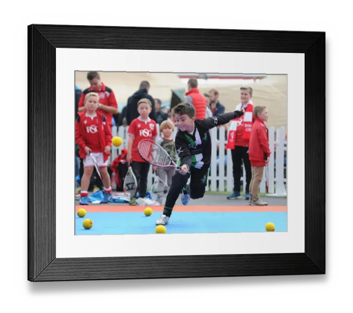 Framed Print : Bristol City Community Trust: Children Play Tennis at Ashton Gate during Bristol City vs MK Dons Match Framed Print : Bristol City Community Trust: Children Play Tennis at Ashton Gate during Bristol City vs MK Dons Match
