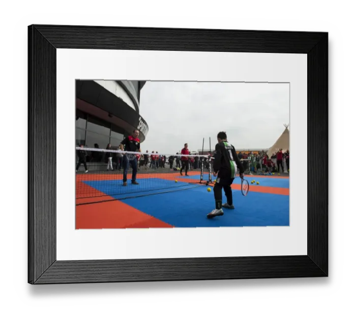 Framed Print : Bristol City Football Match: Children Play Tennis with Community Trust Amidst the Action