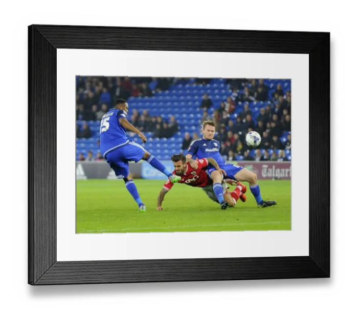 Framed Print : Battling Midfielders: Gunnarsson vs. Pack in Cardiff City vs. Bristol City Championship Clash Framed Print : Battling Midfielders: Gunnarsson vs. Pack in Cardiff City vs. Bristol City Championship Clash