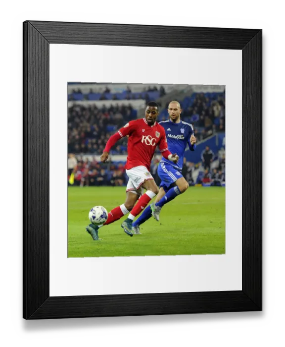 Framed Print : Battling for Supremacy: Kodjia vs. Connolly in Cardiff City vs. Bristol City Championship Clash