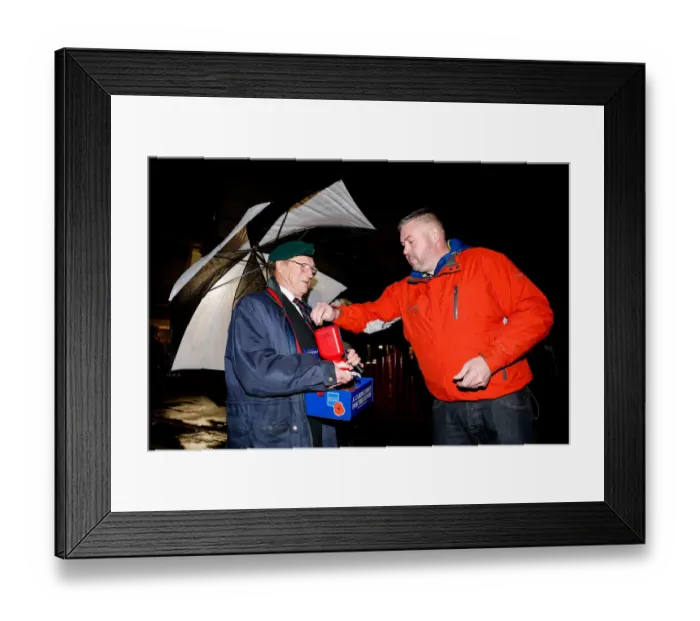 Framed Print : Bristol City's Buster Footman Collects Poppy Donations in the Rain Before Match vs. Wolves