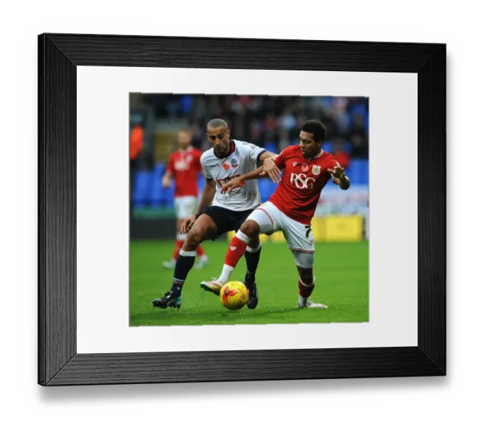 Framed Print : Korey Smith vs Darren Pratley: Intense Battle for Possession in Bolton Wanderers vs Bristol City Championship Clash Framed Print : Korey Smith vs Darren Pratley: Intense Battle for Possession in Bolton Wanderers vs Bristol City Championship Clash